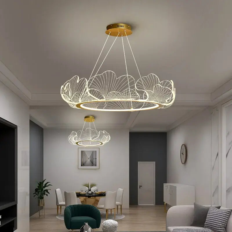Gold-toned decorbites ginkgo leaf chandelier pendant light with intricate illuminated leaf design for living room use