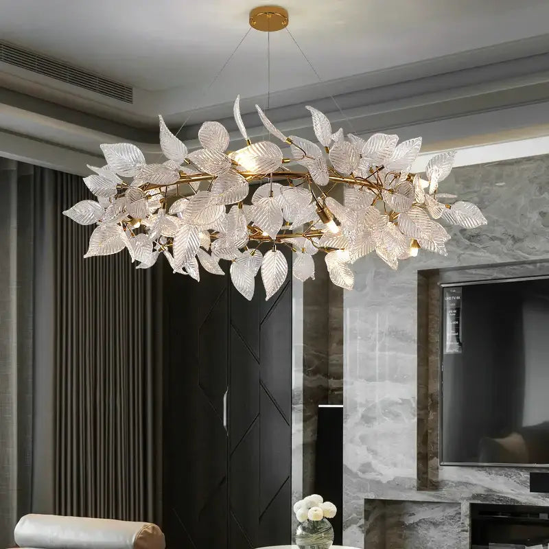 Elegant gold-toned decorbites ginkgo leaf crystal chandelier with translucent leaf glass pieces in branch design