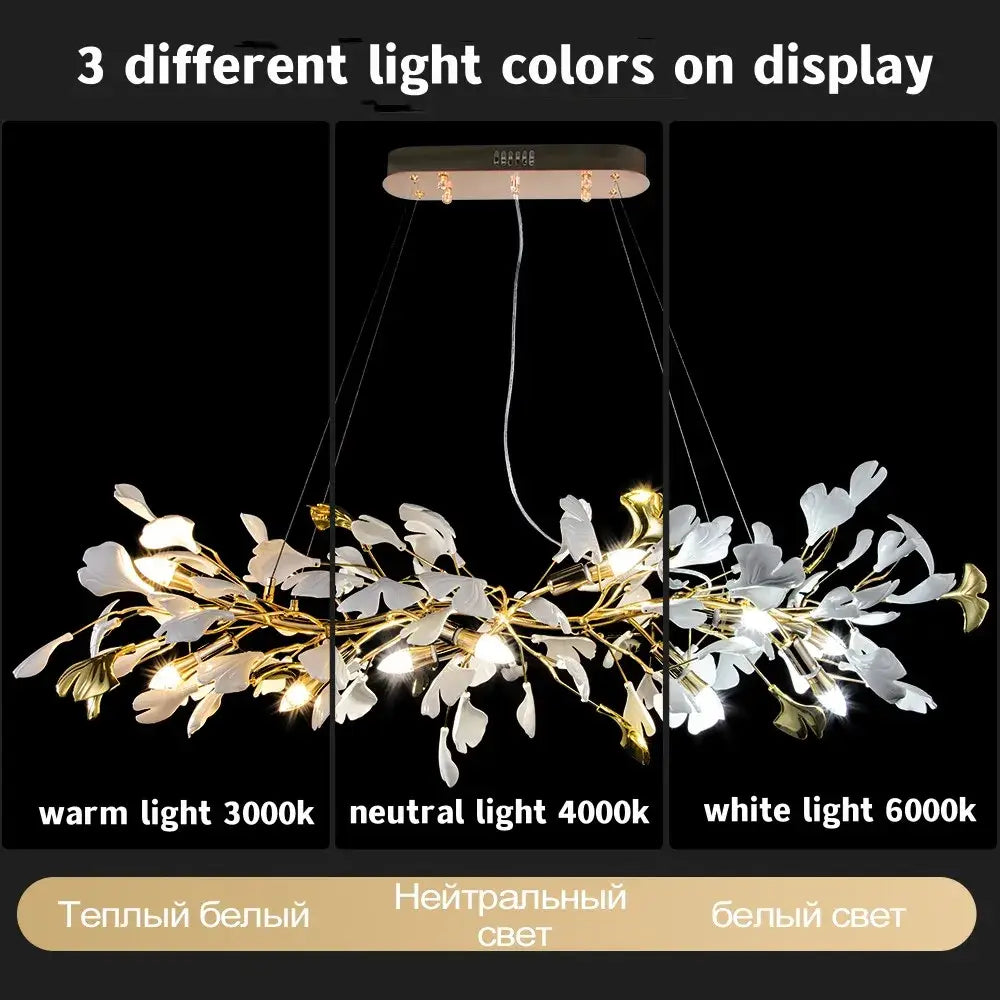 A modern gold-toned decorbites ginkgo leaf crystal chandelier with white and metallic leaf accents for home décor