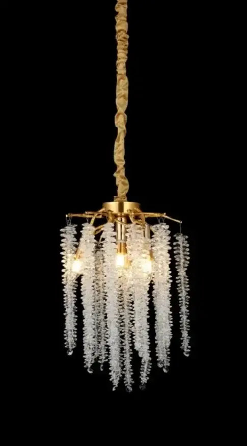 Decorbites ginkgo leaf crystal chandelier with golden frame and cascading clear faceted beads on twisted gold chain