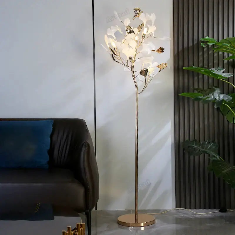 Decorbites ginkgo leaf floor lamp with slender gold metal stem and white flower-shaped LED lights for living room and bedroom