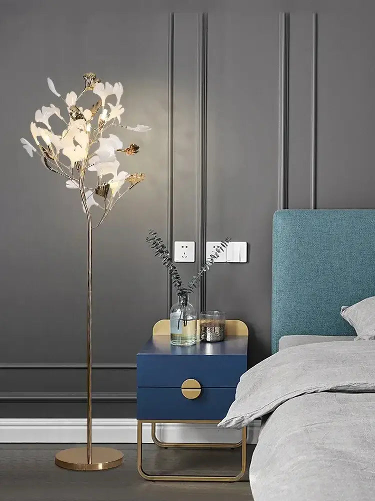 Decorbites ginkgo leaf floor lamp with gold metal frame and white flower-shaped lights for modern living spaces