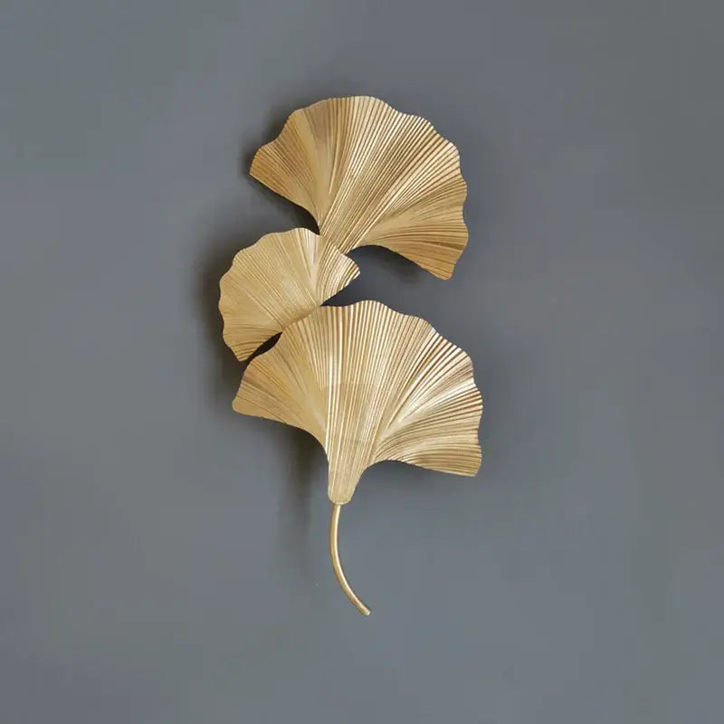 Decorbites ginkgo leaf gold wall lamp featuring metallic ginkgo leaf with detailed veining for hotel bedroom decor