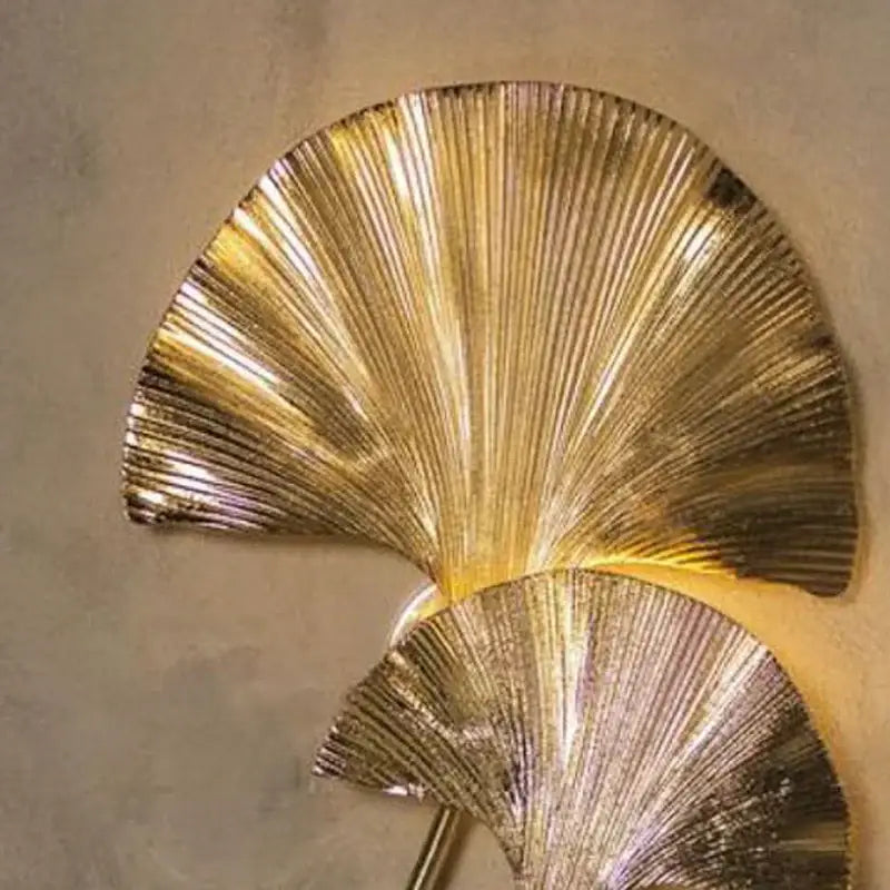 Decorbites ginkgo leaf gold wall lamp with textured metallic fan design for hotel bedroom and corridor lighting
