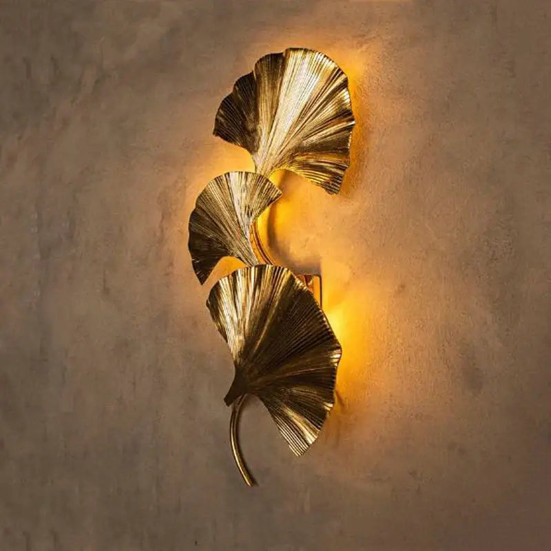 DecorBites ginkgo leaf gold wall lamp with three overlapping metallic leaves for hotel bedroom and corridor