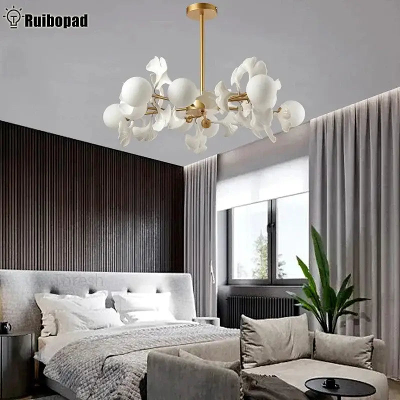 White glass decorbites ginkgo leaf led ceiling chandelier with gold-toned metal accents for modern living spaces