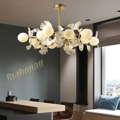 Gold-toned decorbites ginkgo leaf led ceiling chandelier with white petal glass shades and frosted bulbs for living room