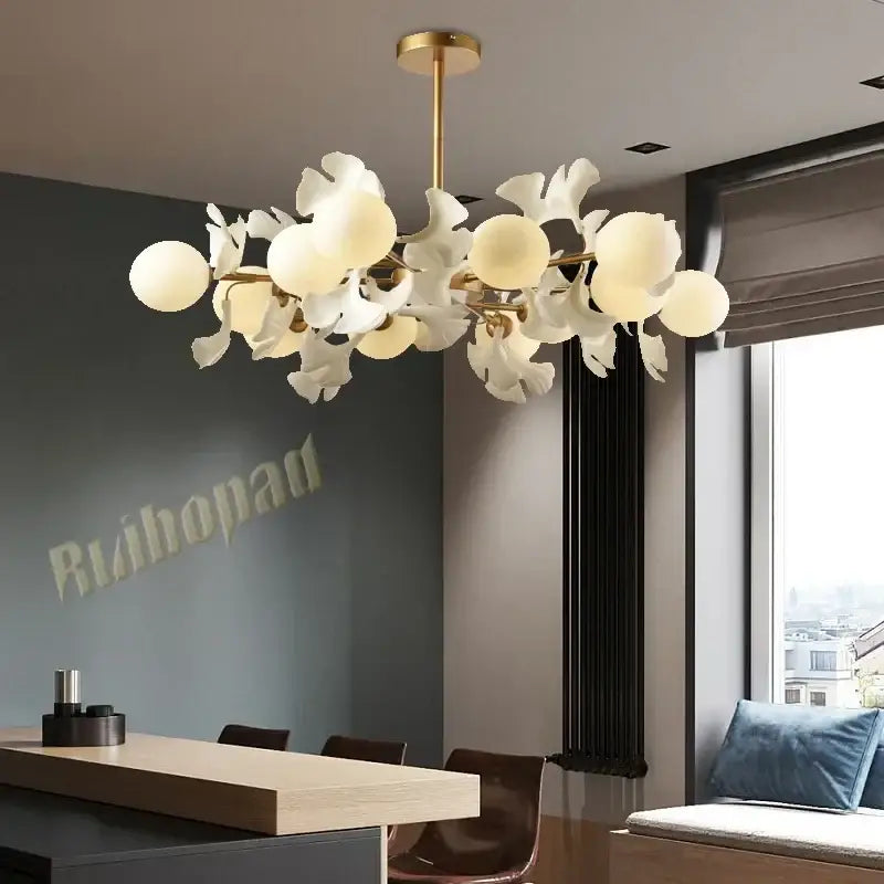 Gold-toned decorbites ginkgo leaf led ceiling chandelier with white petal glass shades and frosted bulbs for living room