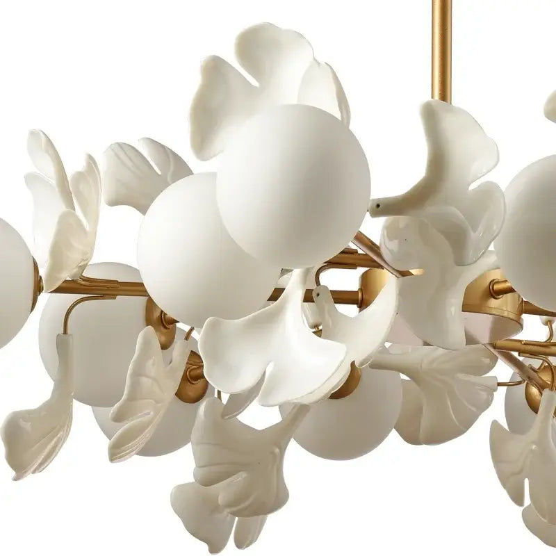 Elegant white ceramic decorbites ginkgo leaf led ceiling chandelier with gold metal arms and glass shades for living spaces