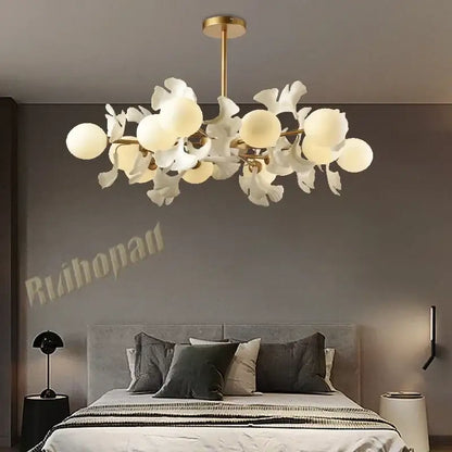 Modern DecorBites™ Ginkgo leaf LED ceiling chandelier with gold metal frame and white petal-shaped glass shades