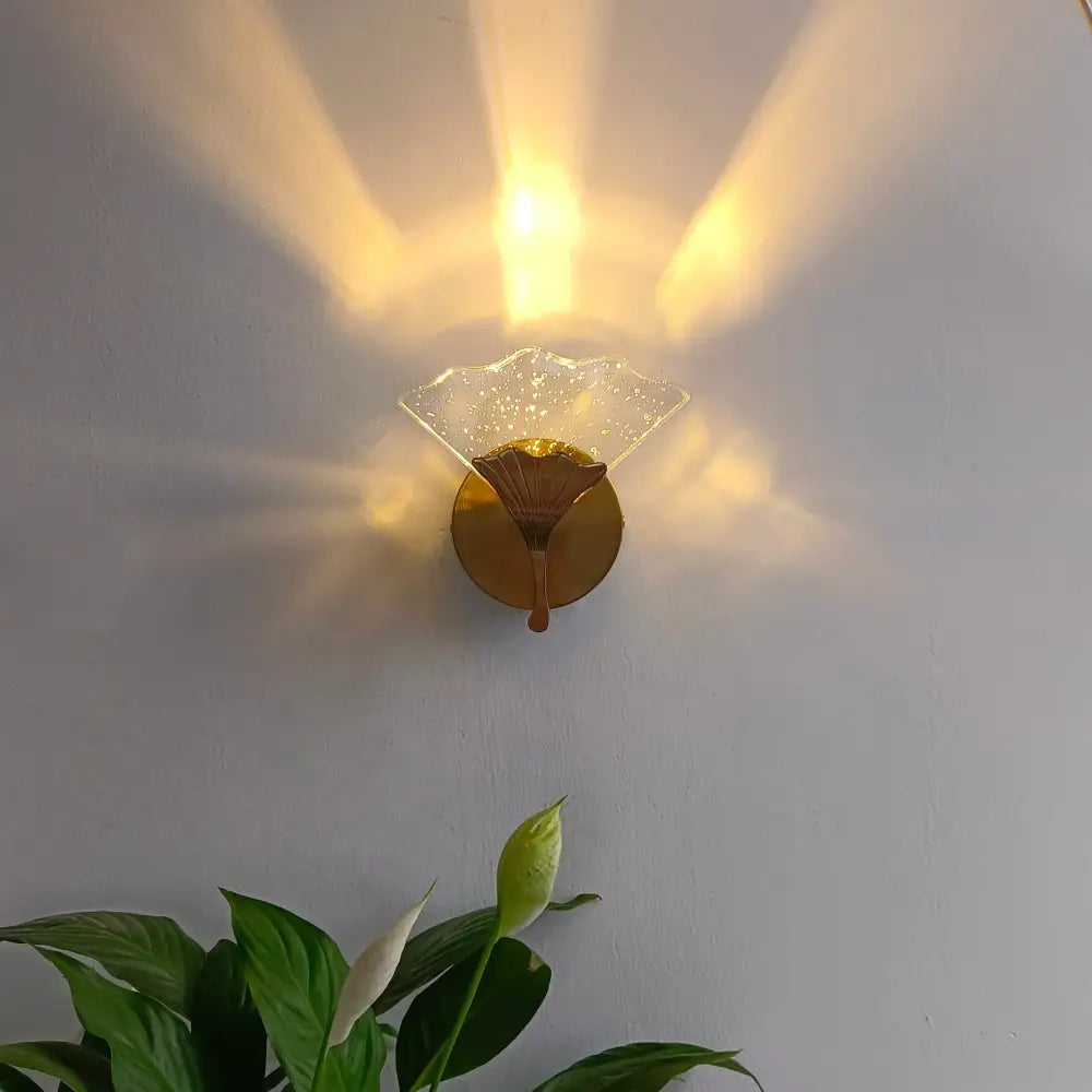 Gold-finished decorbites ginkgo leaf wall lights with translucent textured glass shade for elegant home lighting