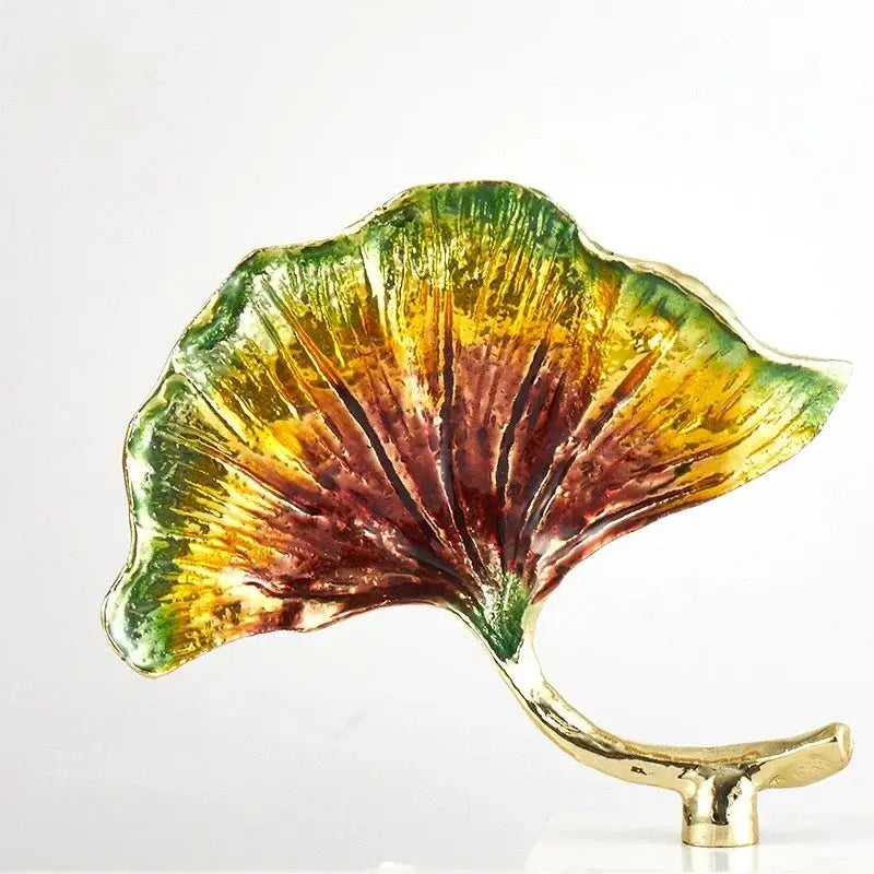 Vibrant hand-painted decorbites ginkgo leaf metal sculpture with glossy gradient colors on gold-colored stand