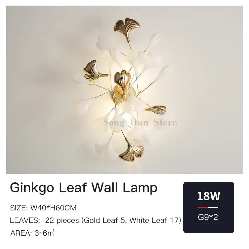 DecorBites ginkgo leaf wall lamp with five gold metallic leaves and seventeen white petals for modern luxury decor