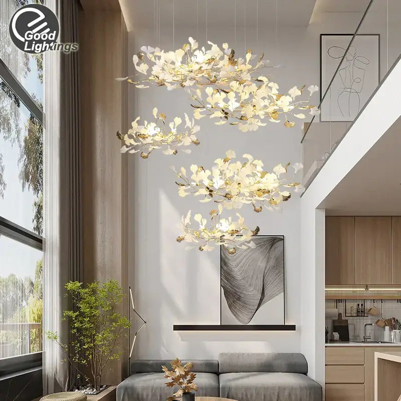 Elegant gold and white leaf-shaped decorbites ginkgo leaves chandelier with modern cascading design for luxury interiors