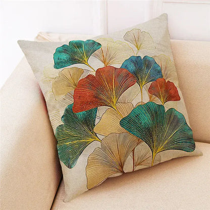 Beige linen cushion cover with vibrant teal rust and gold ginkgo leaves design for modern decor by DecorBites Ginkgo Leaves