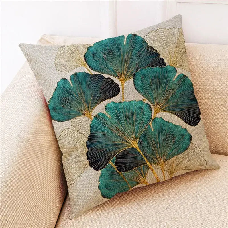 Beige linen cushion cover with vibrant teal and gold ginkgo leaves pattern for modern home decor by DecorBites Ginkgo Leaves