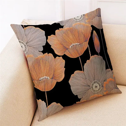 Black DecorBites ginkgo leaves cushion cover featuring embroidered orange and gray poppy flowers for modern home decor