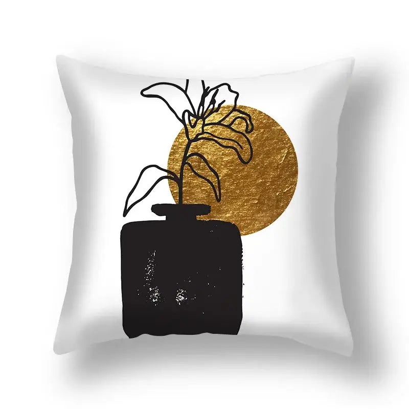 White throw pillow with decorbites ginkgo leaves print featuring minimalist black and gold vase illustration