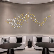 Decorbites ginkgo leaves wall decor featuring a modern metallic gold and silver fish school for living room accents