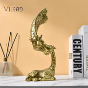 Golden resin DecorBites giraffe head sculpture with intricate textured pattern and elegant curved neck design for decor