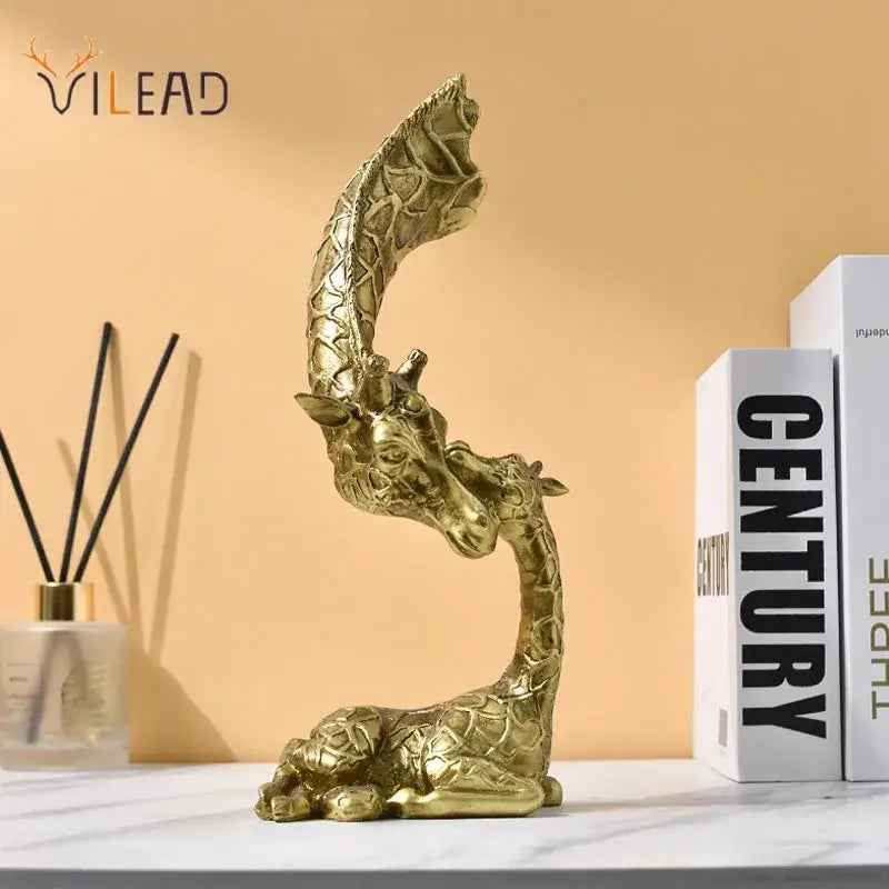 Golden resin DecorBites giraffe head sculpture with intricate textured pattern and elegant curved neck design for decor