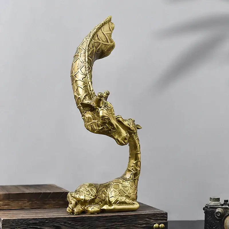 Golden giraffe head sculpture by decorbites featuring intricate patterned texture and detailed resin design for interior decor