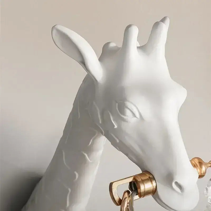 White ceramic giraffe love wall lamp with gold-toned metal accents resin animal bedside lighting decorbites