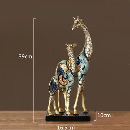 Decorbites giraffe mother and child painted sculpture with gold-toned legs and colorful geometric patterns for modern decor