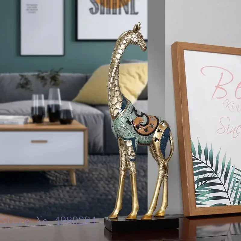 Decorbites giraffe mother and child painted sculpture with gold textured body and intricate teal blue brown accents