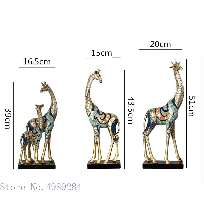 Set of three decorbites giraffe mother and child painted sculpture figurines with gold legs and blue teal orange mosaic patterns