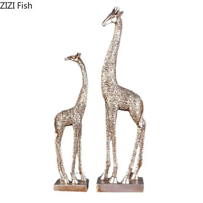 Silver-toned giraffe resin statue ornament with intricate floral embossing on rectangular bases for desk decor