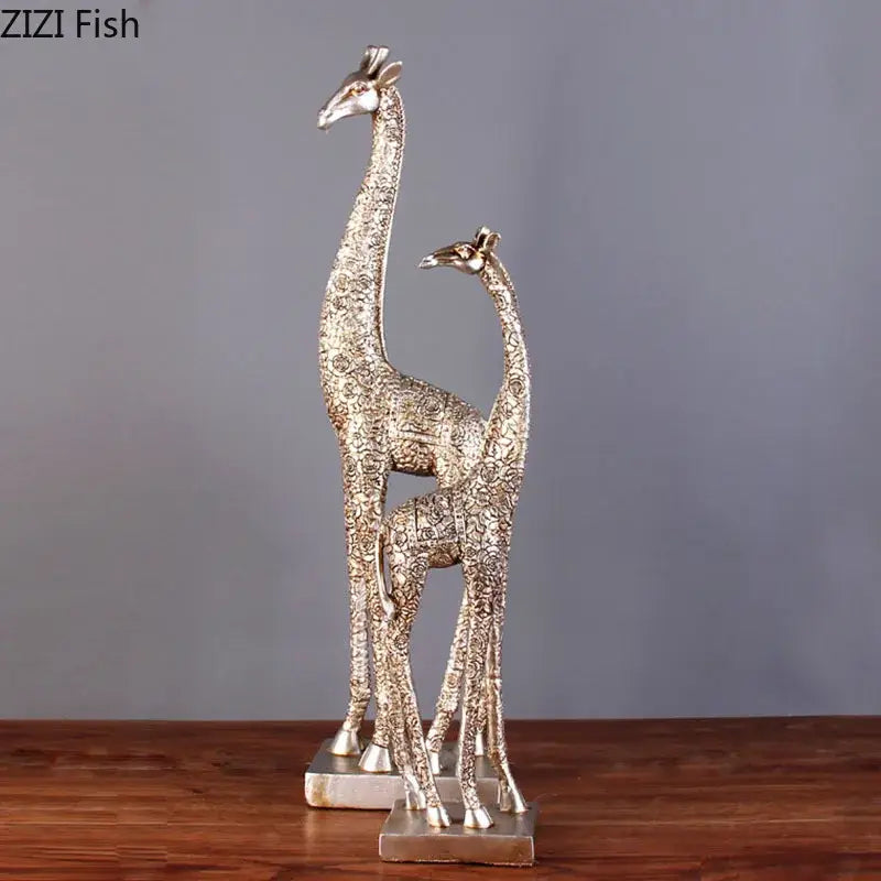 DecorBites™ silver-toned giraffe resin statue ornament with intricate textures and metallic finish for room decor