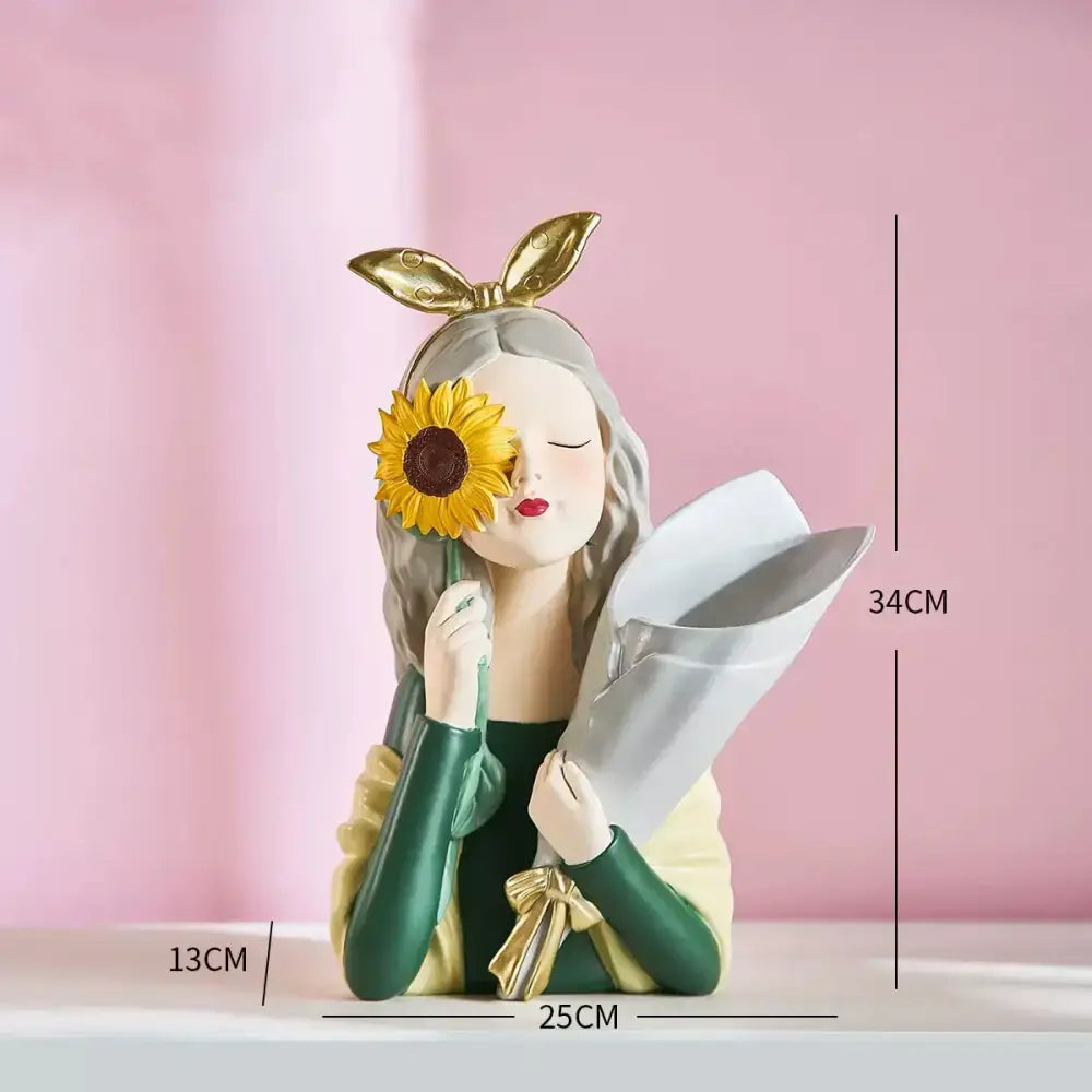 A decorbites girl statues resin figurine with silver hair gold bunny ears holding a sunflower and wrapped bouquet for vase ornaments