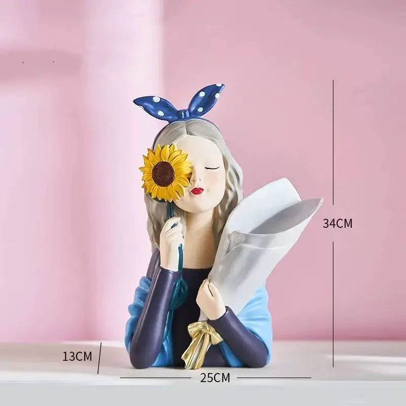 A resin decorbites girl statues figurine with long blonde hair blue polka-dot bow holding sunflower and bouquet