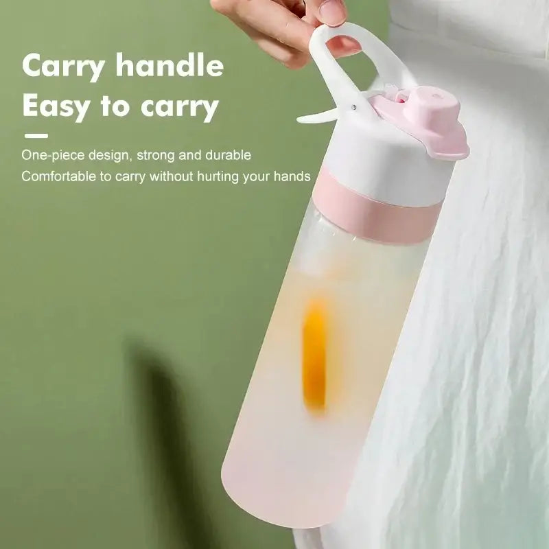 Pink and white decorbites girls 700ml one-piece spray water bottle with carrying handle for sports and travel