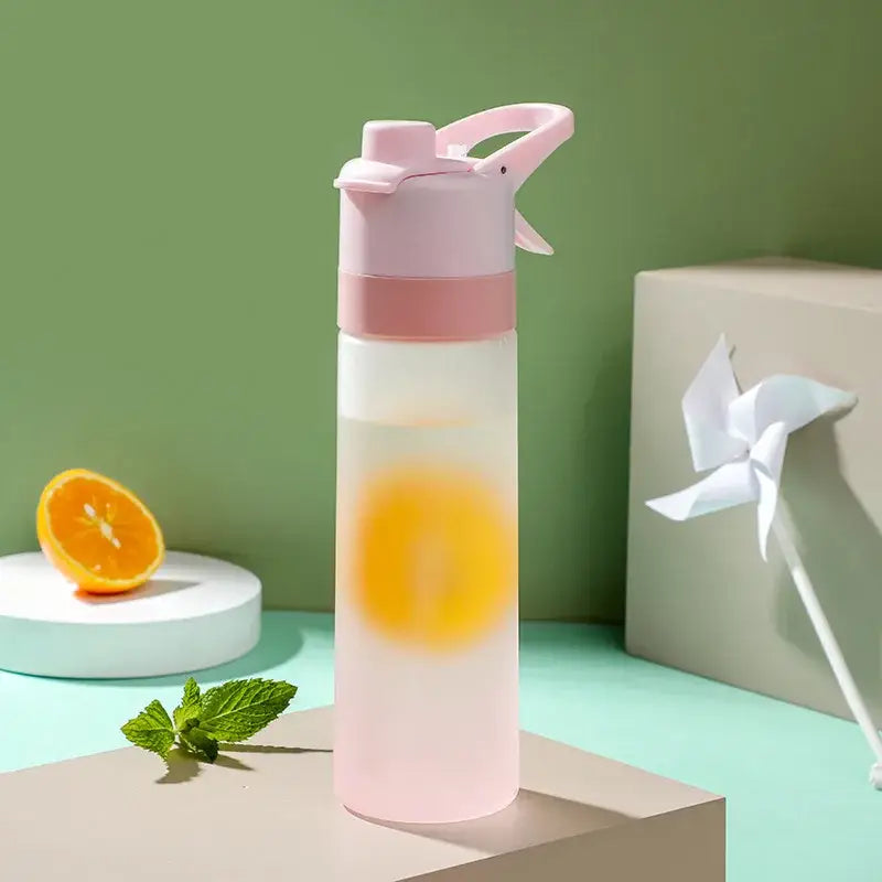 Pink translucent decorbites girls 700ml spray water bottle with matching lid and handle for outdoor sports and travel