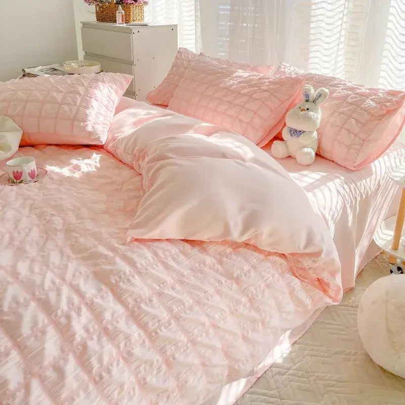 Pink quilted bedding set with satin finish and geometric stitching from decorbites girls bubble gauze comforter kit