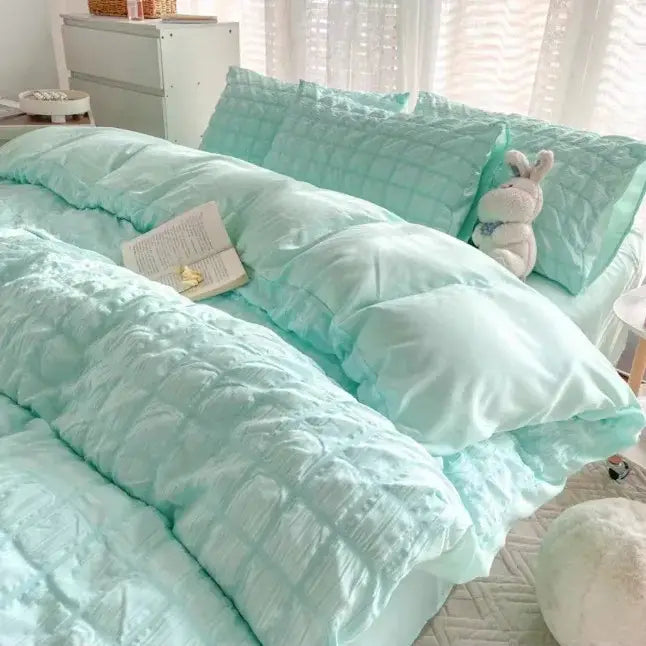 Mint green decorbites girls bubble gauze bedding set with quilted comforter and matching pillows featuring plush bunny toy