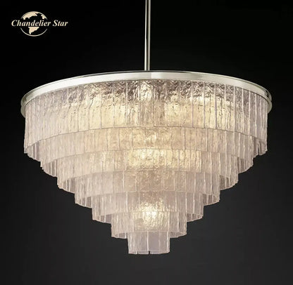 A tiered decorbites glace modern glass chandelier with frosted textured panels and polished chrome for living dining rooms