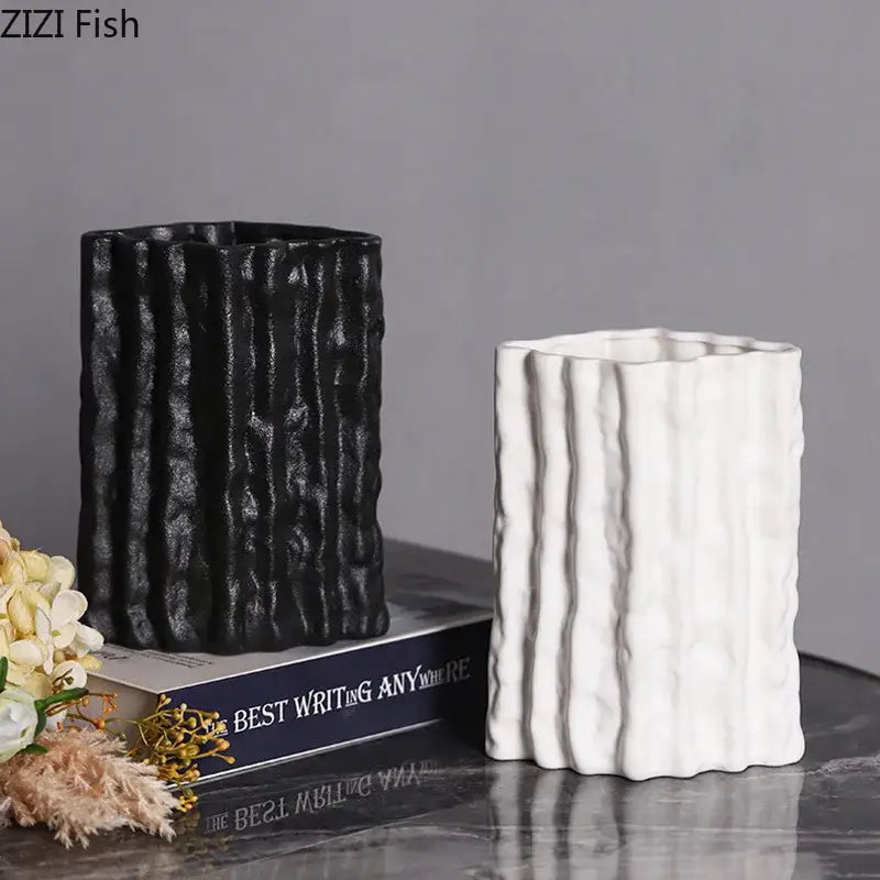 Black and white ceramic vases with vertical ribbed texture from decorbites glacial ceramic vase collection for room decor