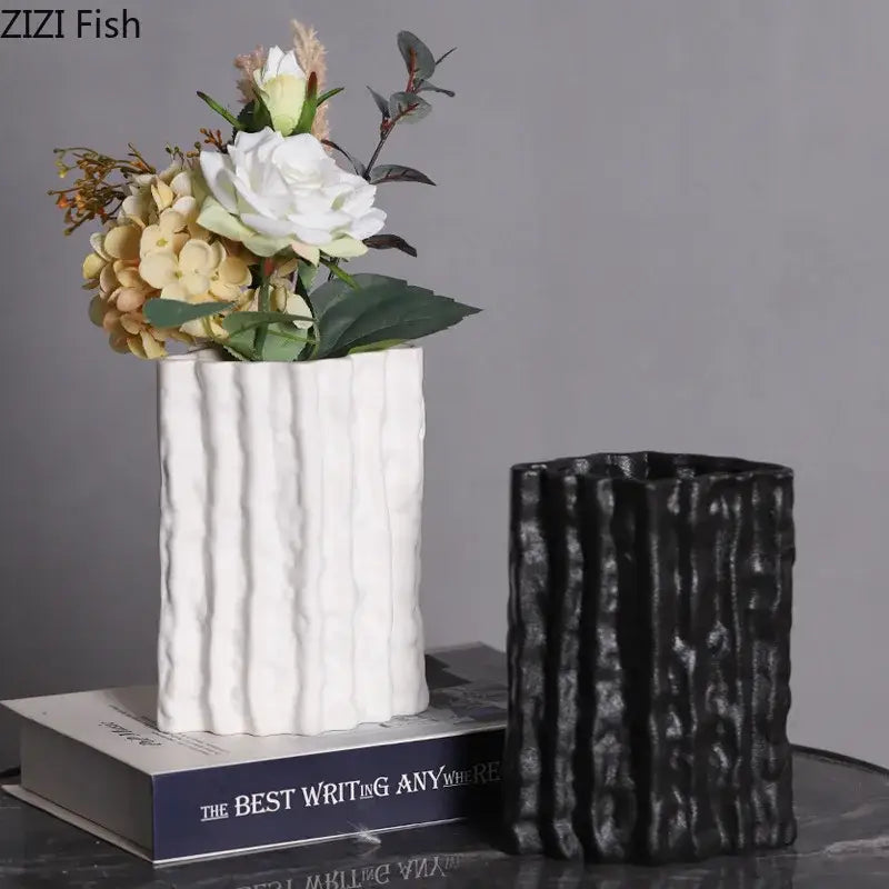 White ceramic vase with vertical ribbed texture holding artificial flowers for decorbites glacial ceramic vase decor