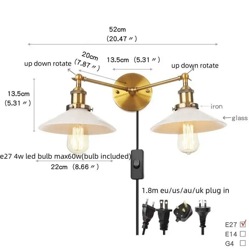 Brass-finished wall sconce with frosted glass shades and pull chain switch featuring Edison-style bulbs for bedroom use