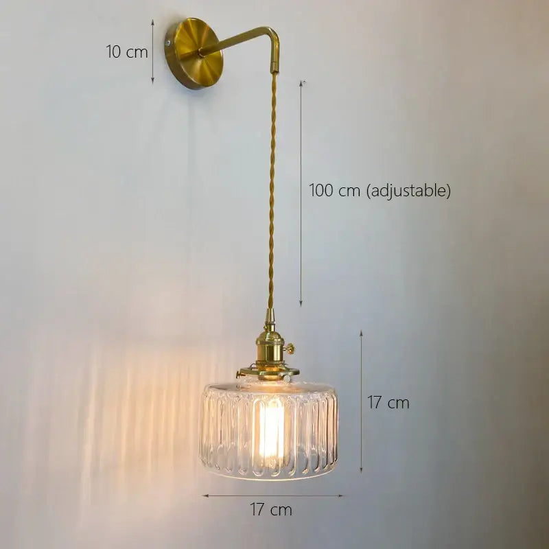Decorbites glass adjustable led sconce wall light featuring vintage brass and clear ribbed glass shade with adjustable cord