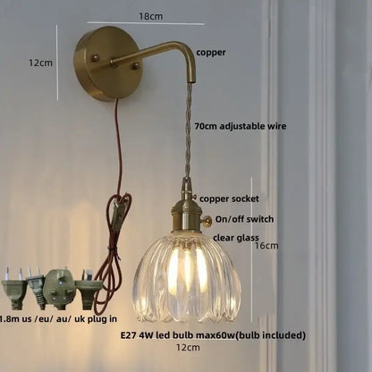 Antique brass-finished decorbites glass adjustable led wall lamp with clear ribbed shade and adjustable copper wire
