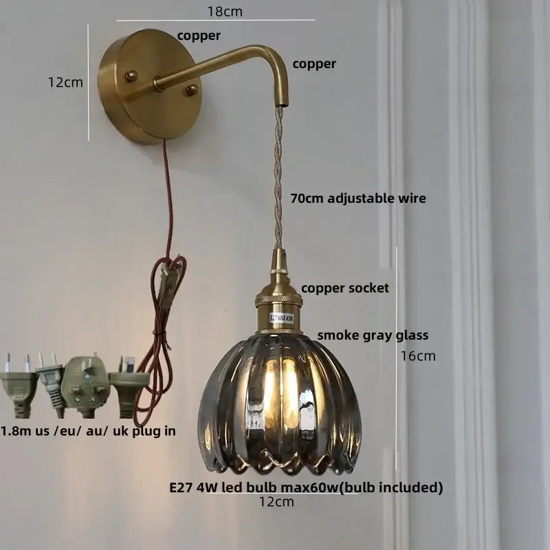 Antique brass-finished decorbites glass adjustable led wall lamp with textured smoke gray glass shade and pull chain switch