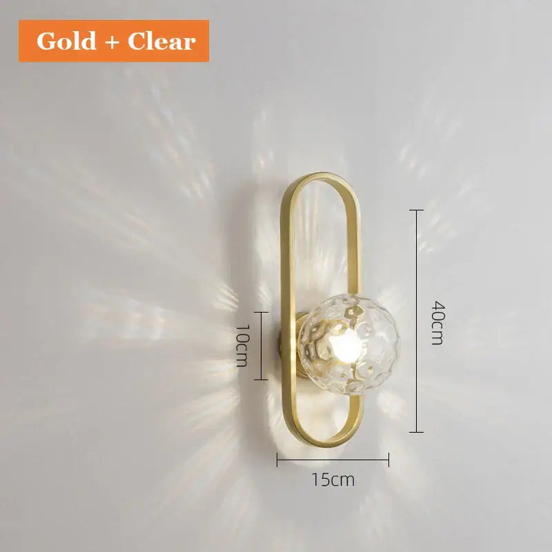 Gold-toned decorbites glass aisle wall lamp with clear faceted glass globe for post-modern indoor lighting decor