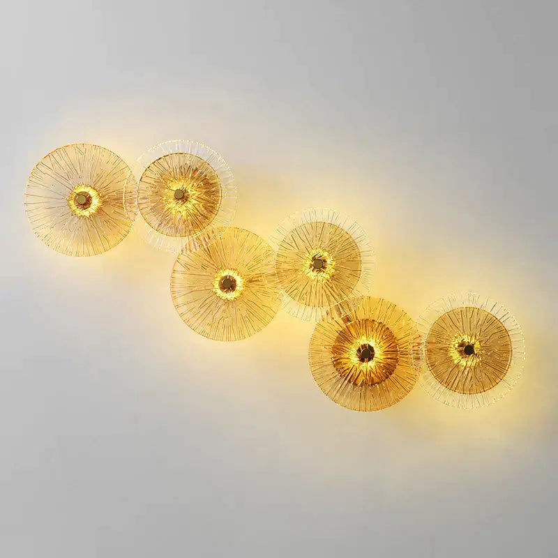 Golden circular decorbites glass aisle wall light with delicate radiating wireframe design modern wall lamp for living room