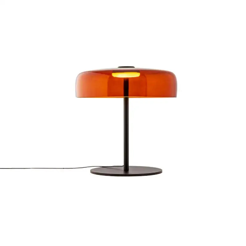 A sleek decorbites glass amber green table lamp with a black metal base for bedroom or living room decor