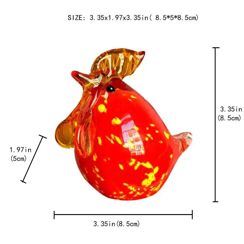 Vibrant red glass animal figurine with golden-yellow speckles and amber wings from decorbites glass animal figurines collection