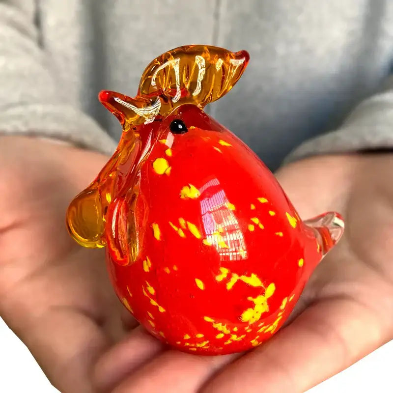 A vibrant red glass animal figurine rooster with golden-yellow speckles from decorbites glass animal collectibles